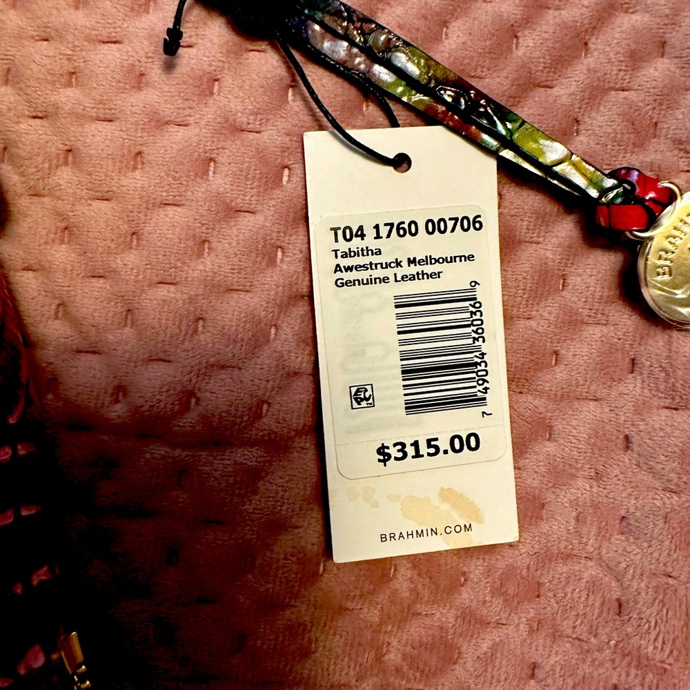 This is a Brahmin Awestruck Tabitha with registration and bag.  Purse new.